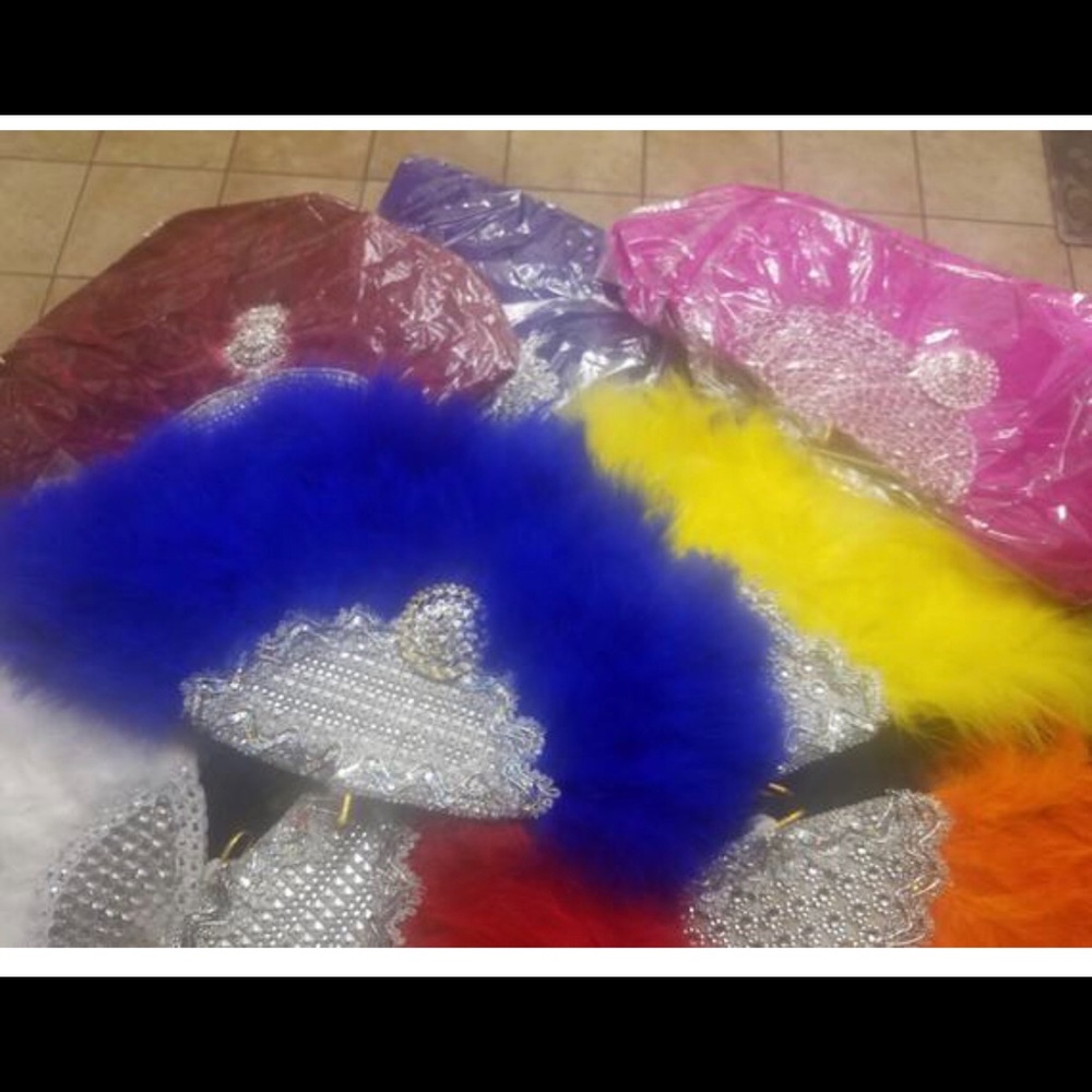 Red feathers hand beaded fan